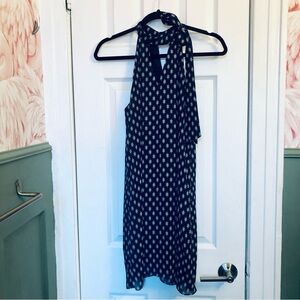 Fun and flirty! The Vanity Room blue and white mini dress with tie at neck. Sz s